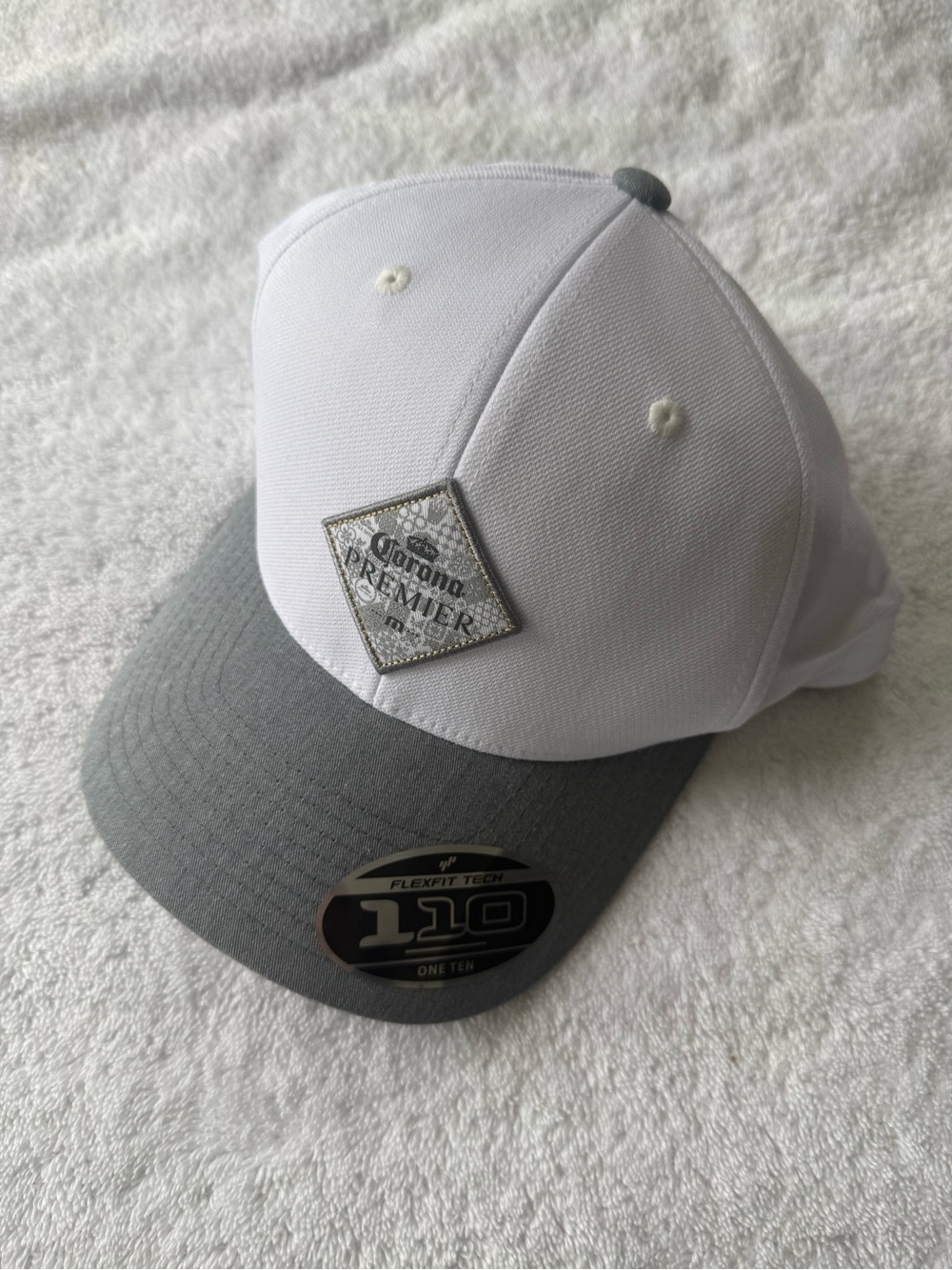 Travis Mathew Flexfit Hat with Corona logo
